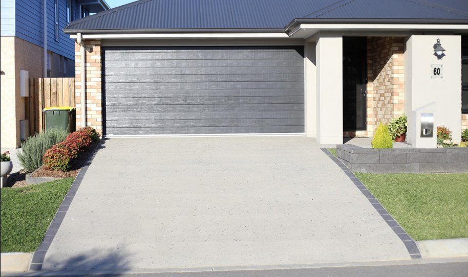 Home Concrete driveway built by High Calibre Concrete Construction