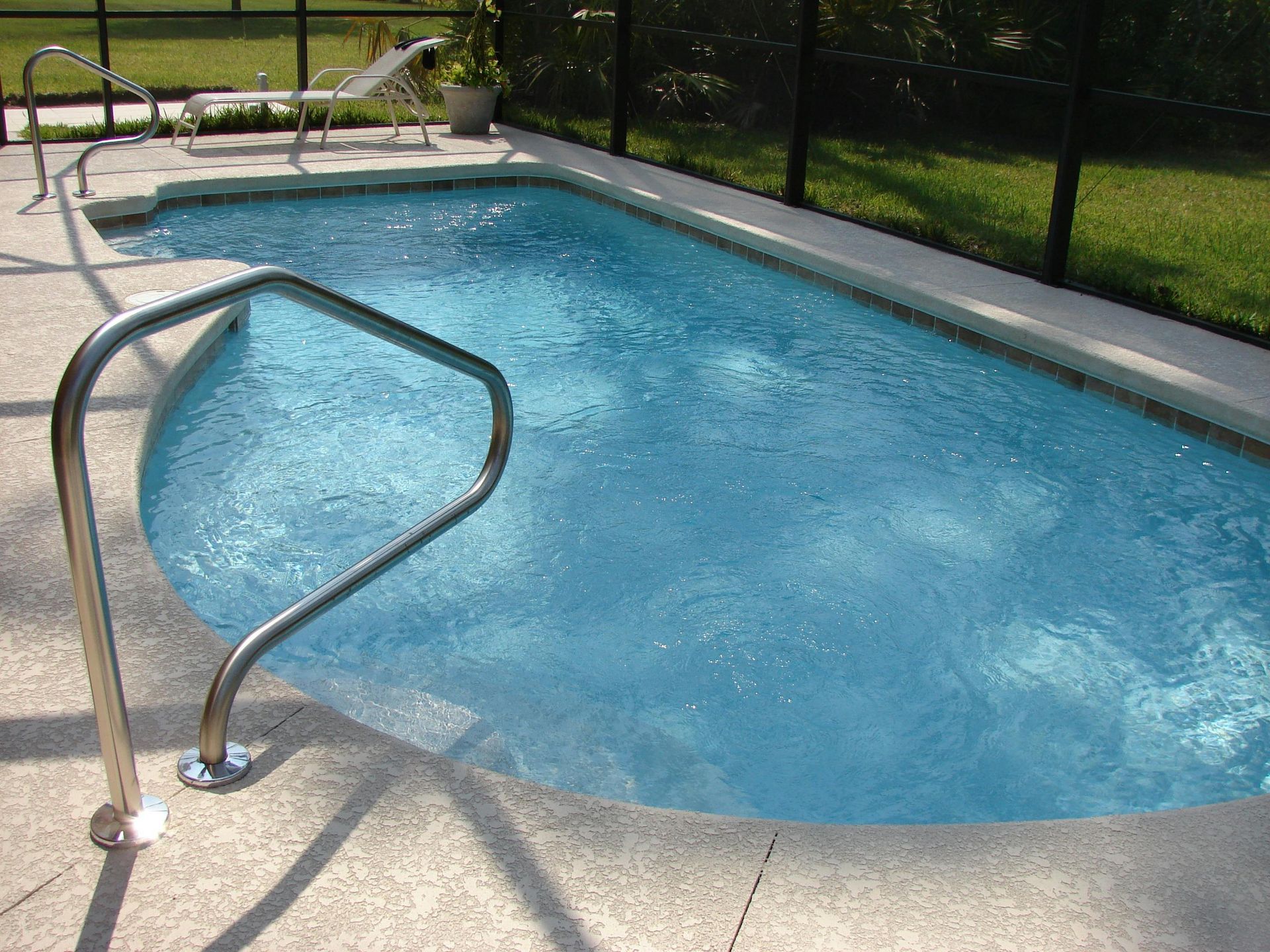 Home Concrete pool surround with slip resistant finish