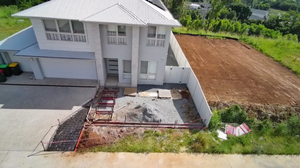 House slab site preparation with formwork and reinforcement